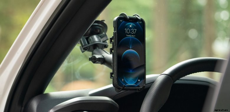 Ram Mount holding a phone to the windshield of a vehicle